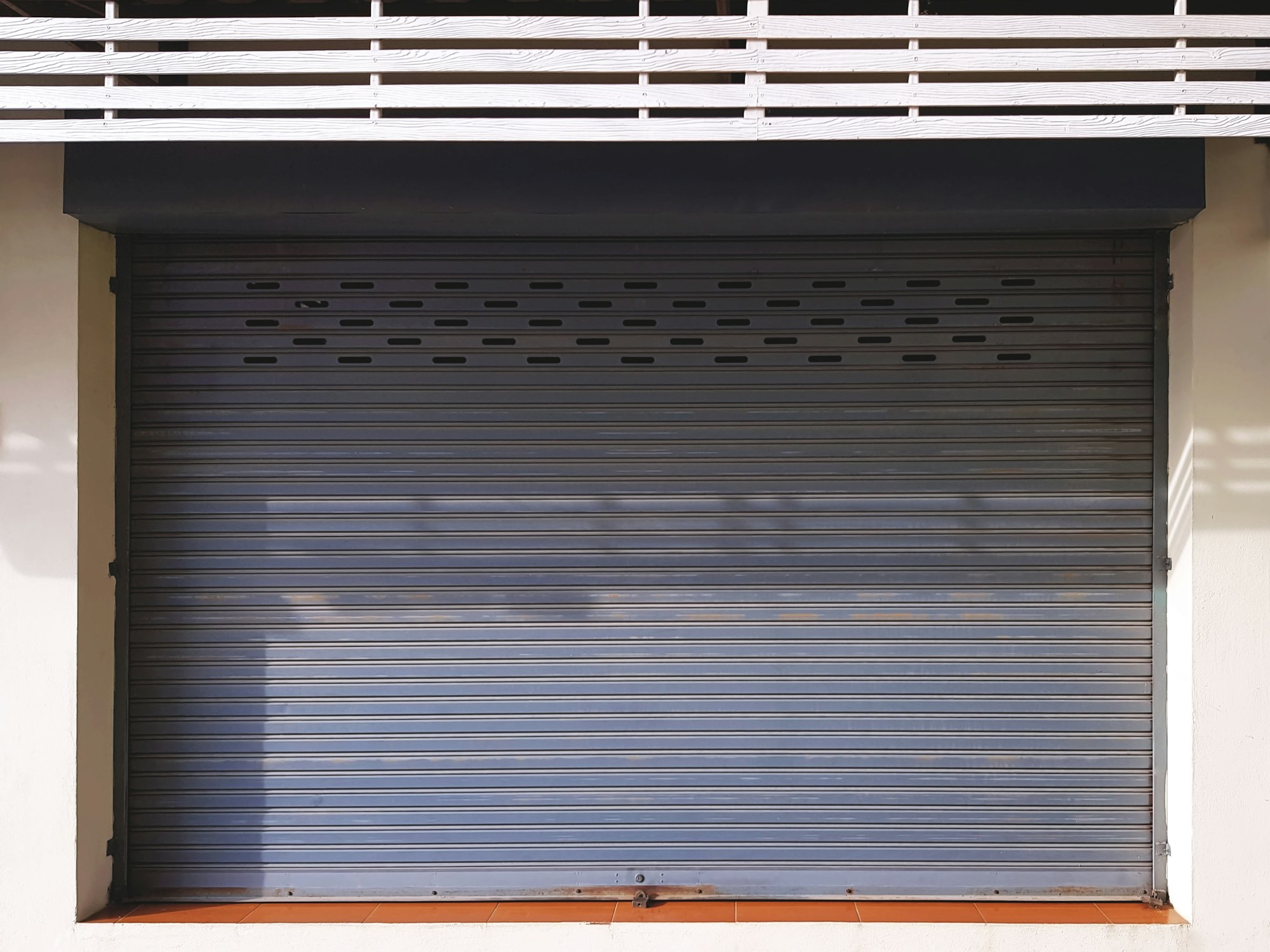 Full Frame Corrugated Metal Door at Store Front